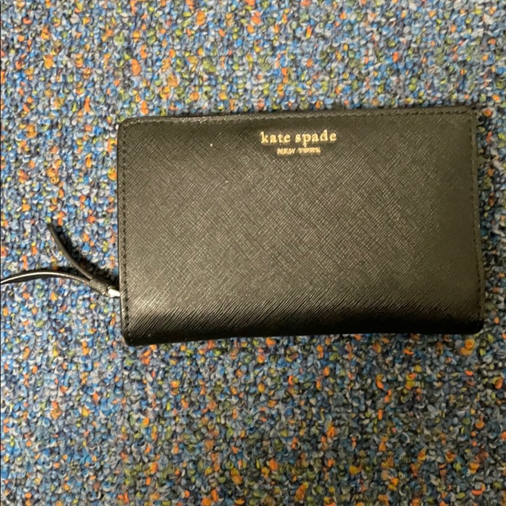Beautiful black wallet make an offer must sell